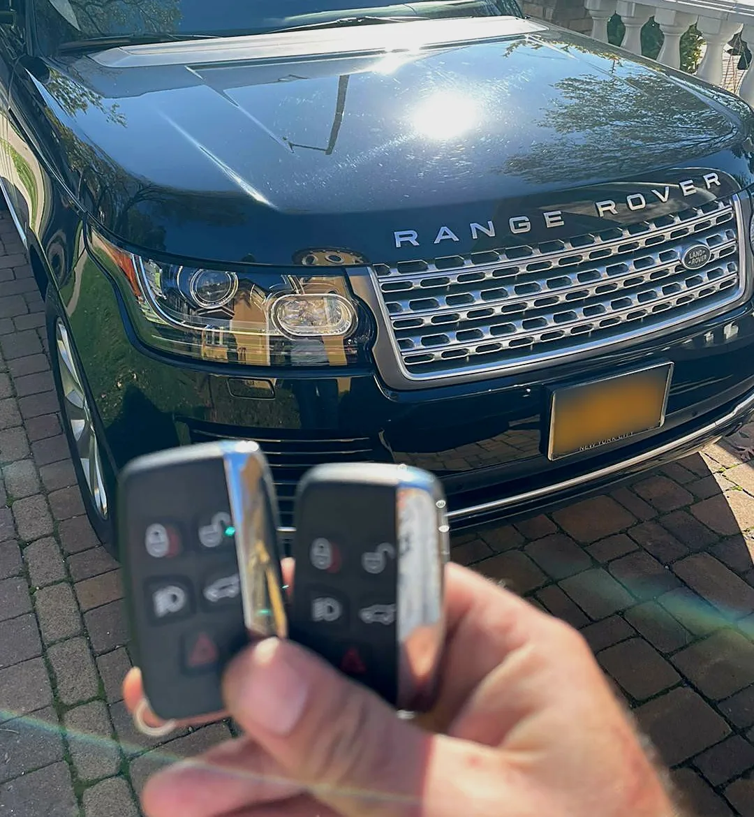 Two new Range Rover smart keys made on site by a Nassau County mobile locksmith