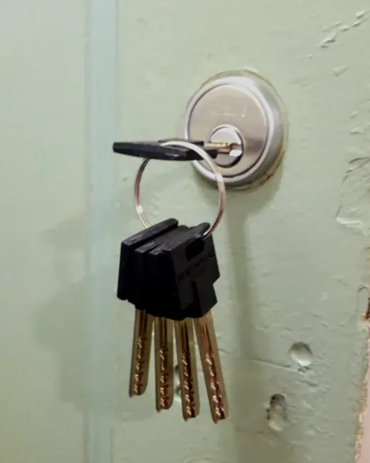 Rekeyed deadbolt with a new set of keys