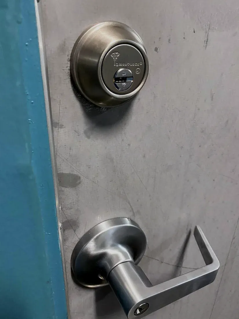 Deadbolt and lever lock on a home entry door